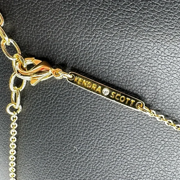 Kendra Scott Gold Heart Necklace with Ivory Mother of Pearl. - Picture 6 of 9